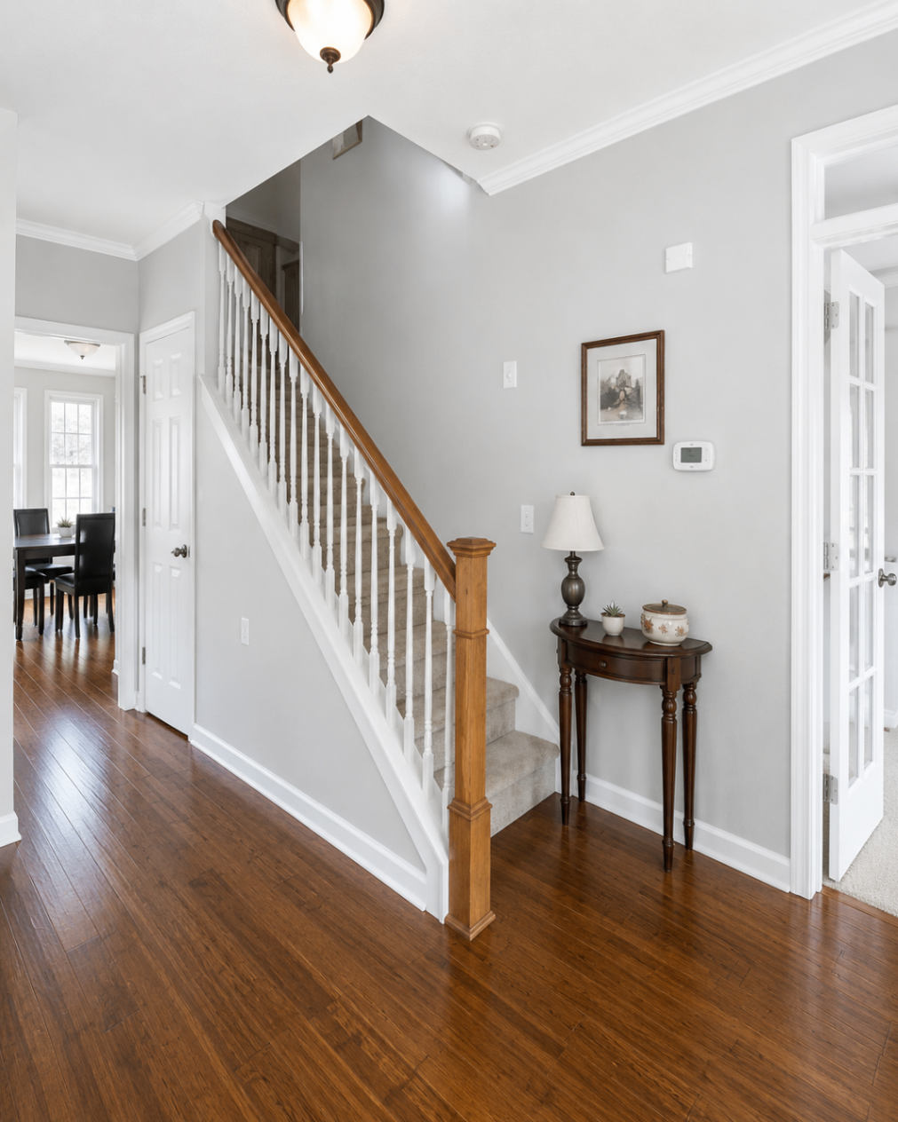 Warm Tan to Modern Gray Foyer — after