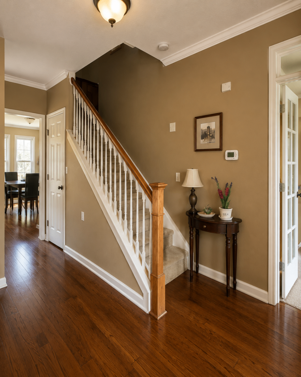 Warm Tan to Modern Gray Foyer — before